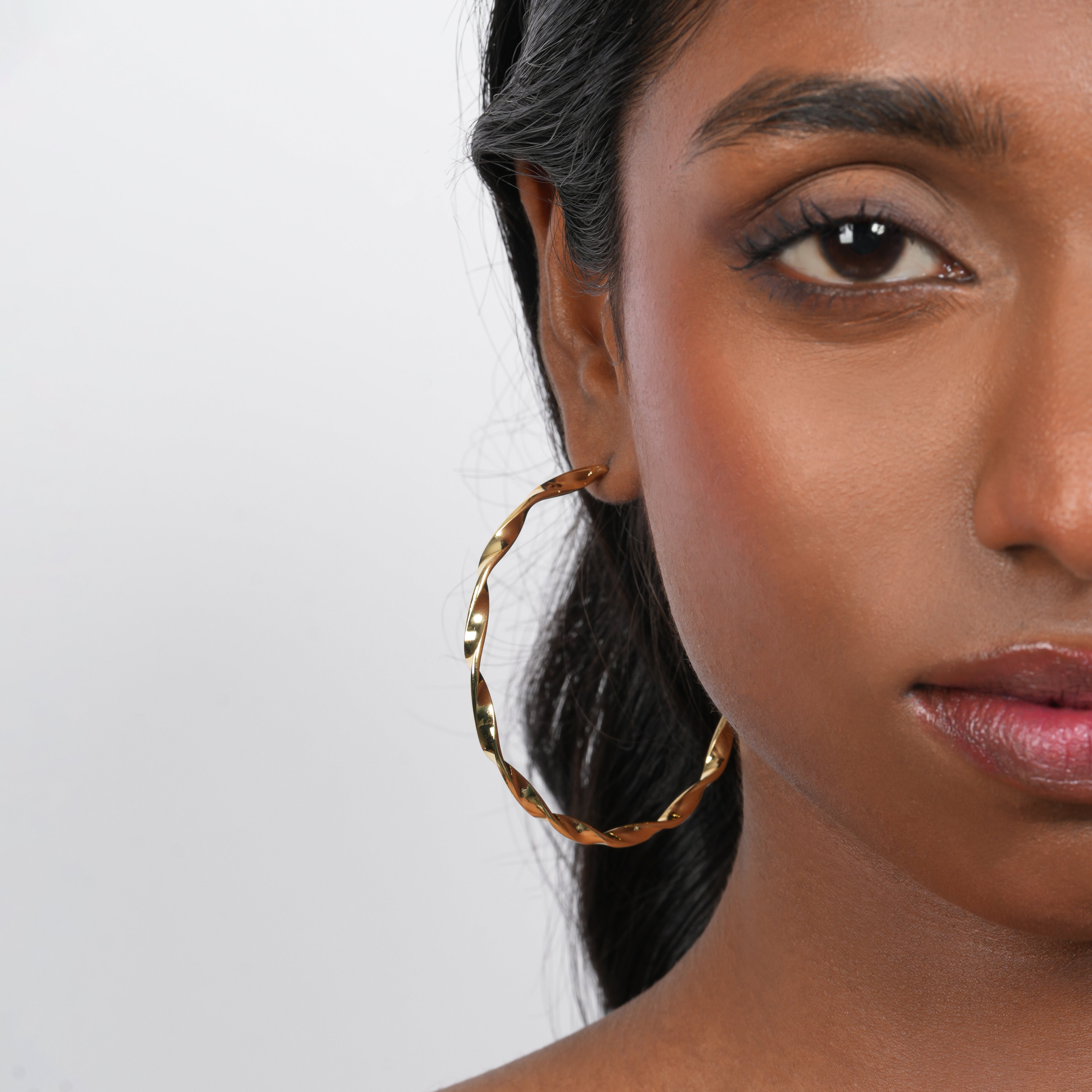 Spiral Gleam Hoop Earrings