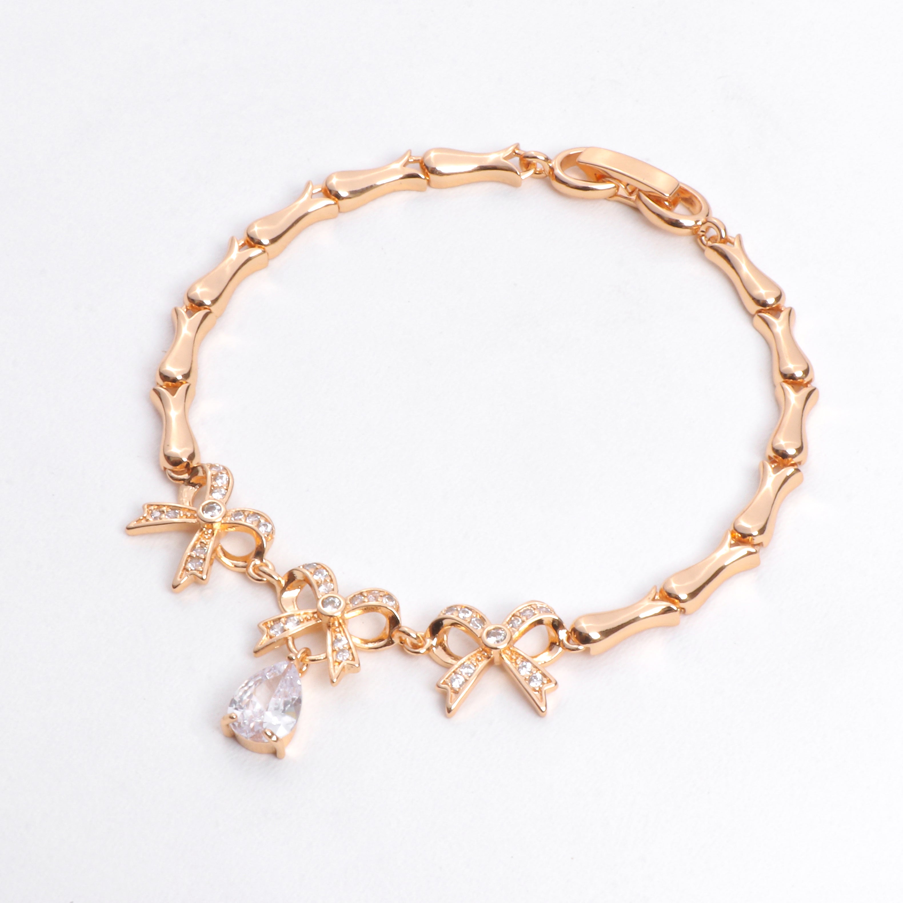 Rose Gold Ribbon Charm Bracelet