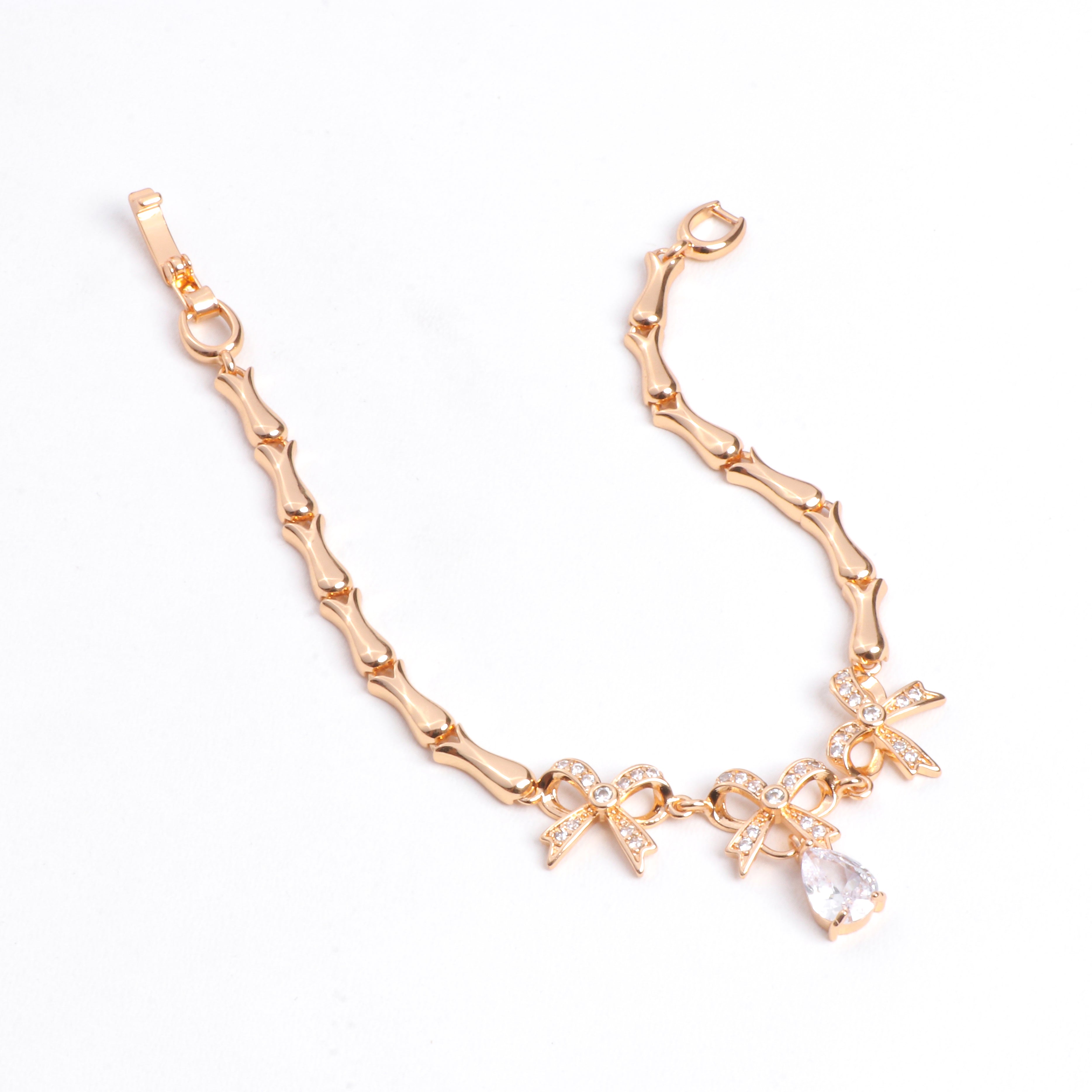 Rose Gold Ribbon Charm Bracelet